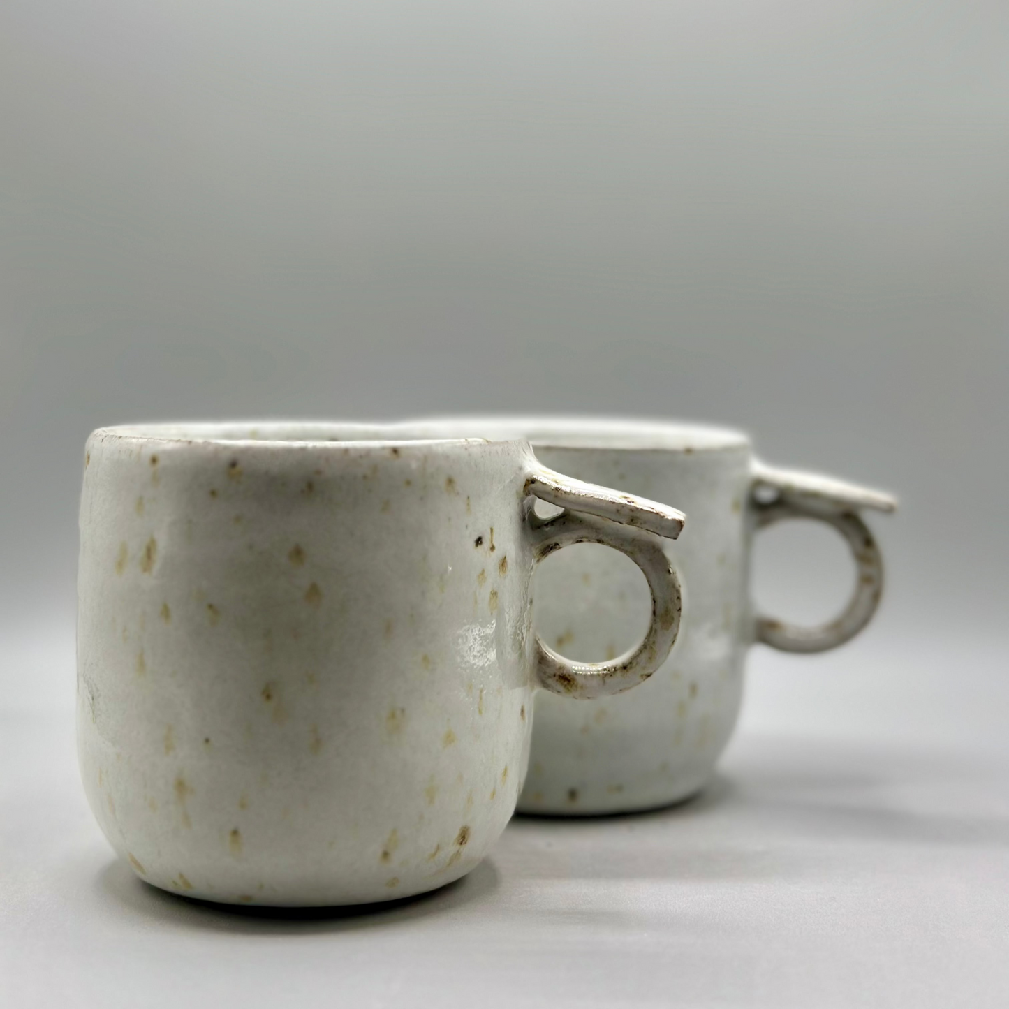 Ergonomic Grip ceramic mugs
