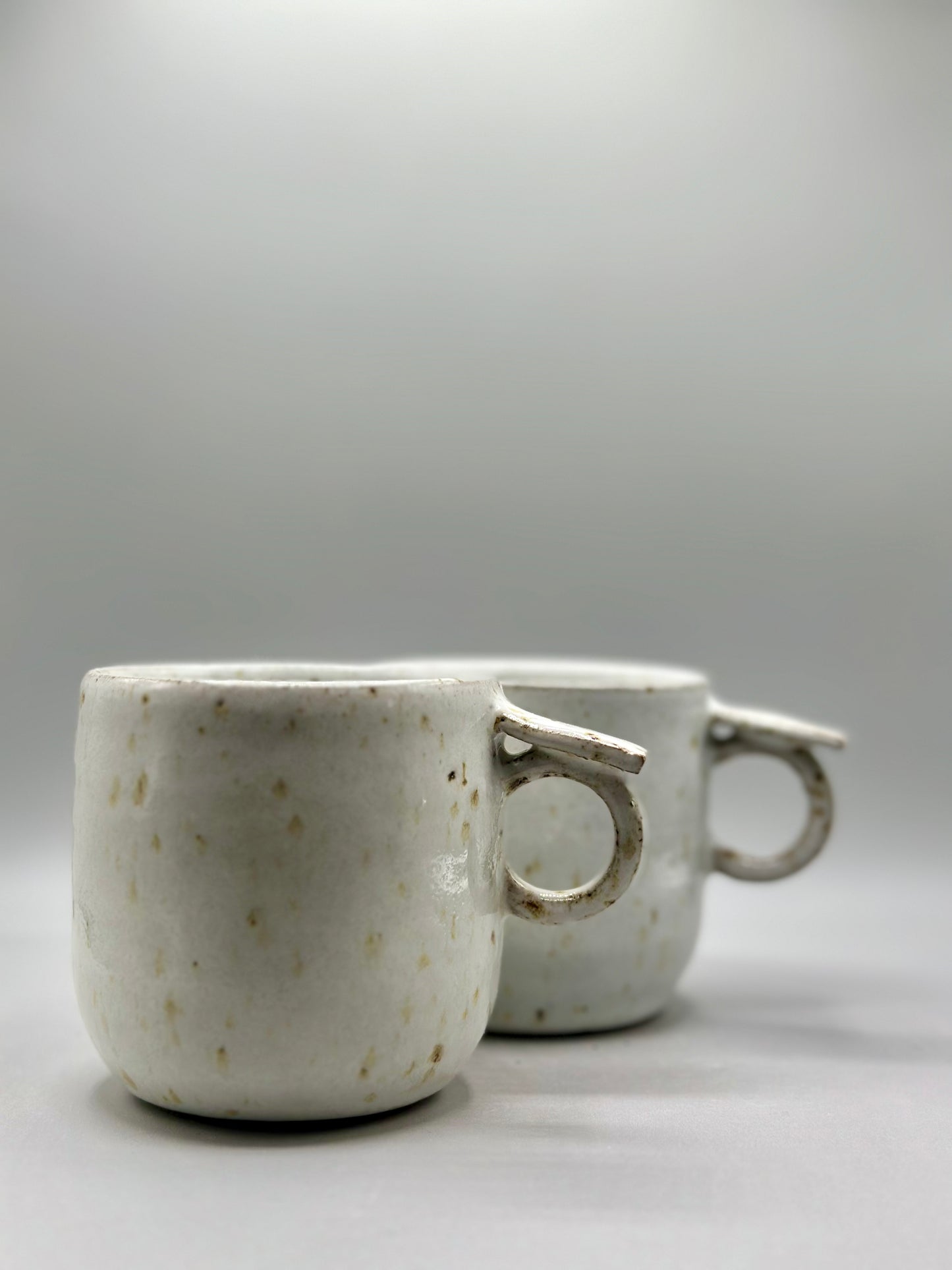 Ergonomic Grip ceramic mugs